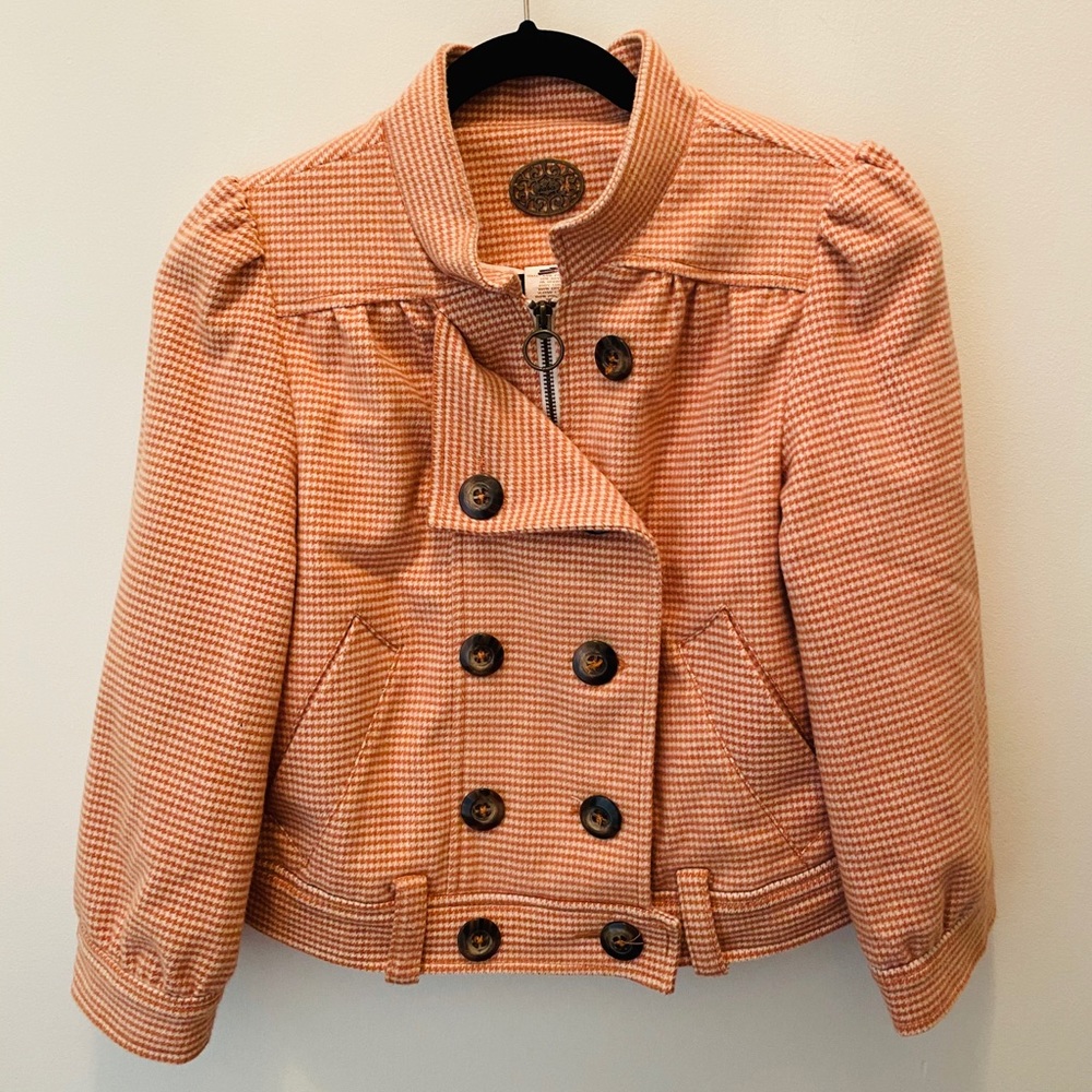 Orange and white houndstooth pea coat